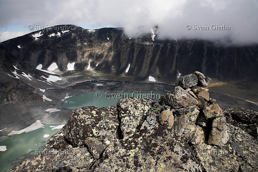 Trollsteintjønne lake and Rundhøe (left). Jotunheimen National Park. Norway