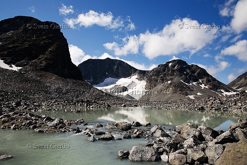 In Trollsteinkvelven valley. Loooking towards Svartholshøe, Trollstein-Rundhøe, and Grotbreahesten (right to left). Jotunheimen National Park. Norway.