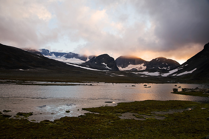 In Trollsteinkvelven valley. Loooking towards Svartholshøe, Trollstein-Rundhøe, Grotbreahesten, Trollsteineggje and Glittertinden, Norways second highest mountain (right to left) and Grotbrean glacier. Jotunheimen National Park. Norway.