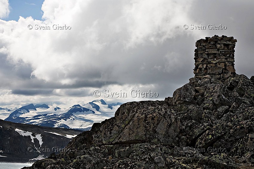 Trollstein-Rundhøe with Galdhøpiggen, Norways highest mountain in the distance. Jotunheimen National Park. Norway.