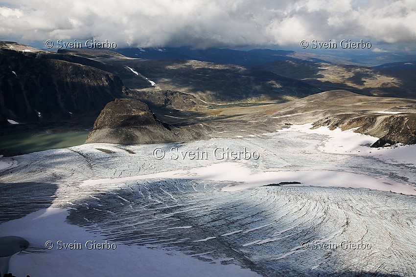 Grotbrean glacier and Trollsteinkvelven valley from Trollsteineggje. Jotunheimen National Park. Norway.